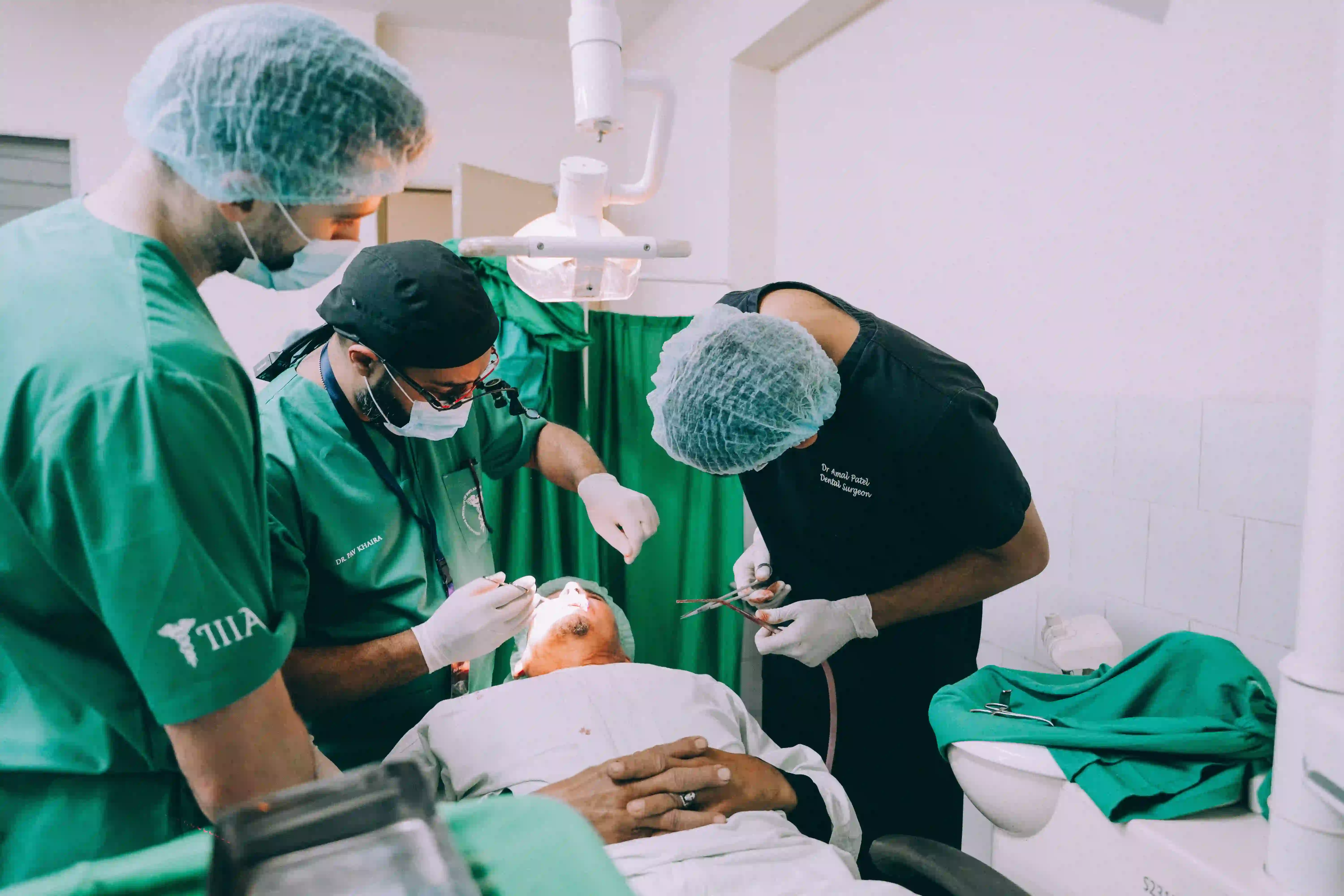 Dentist placing an implant under faculty supervision at Implantex Academy